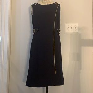 Navy blue Calvin Klein sleeveless dress.
